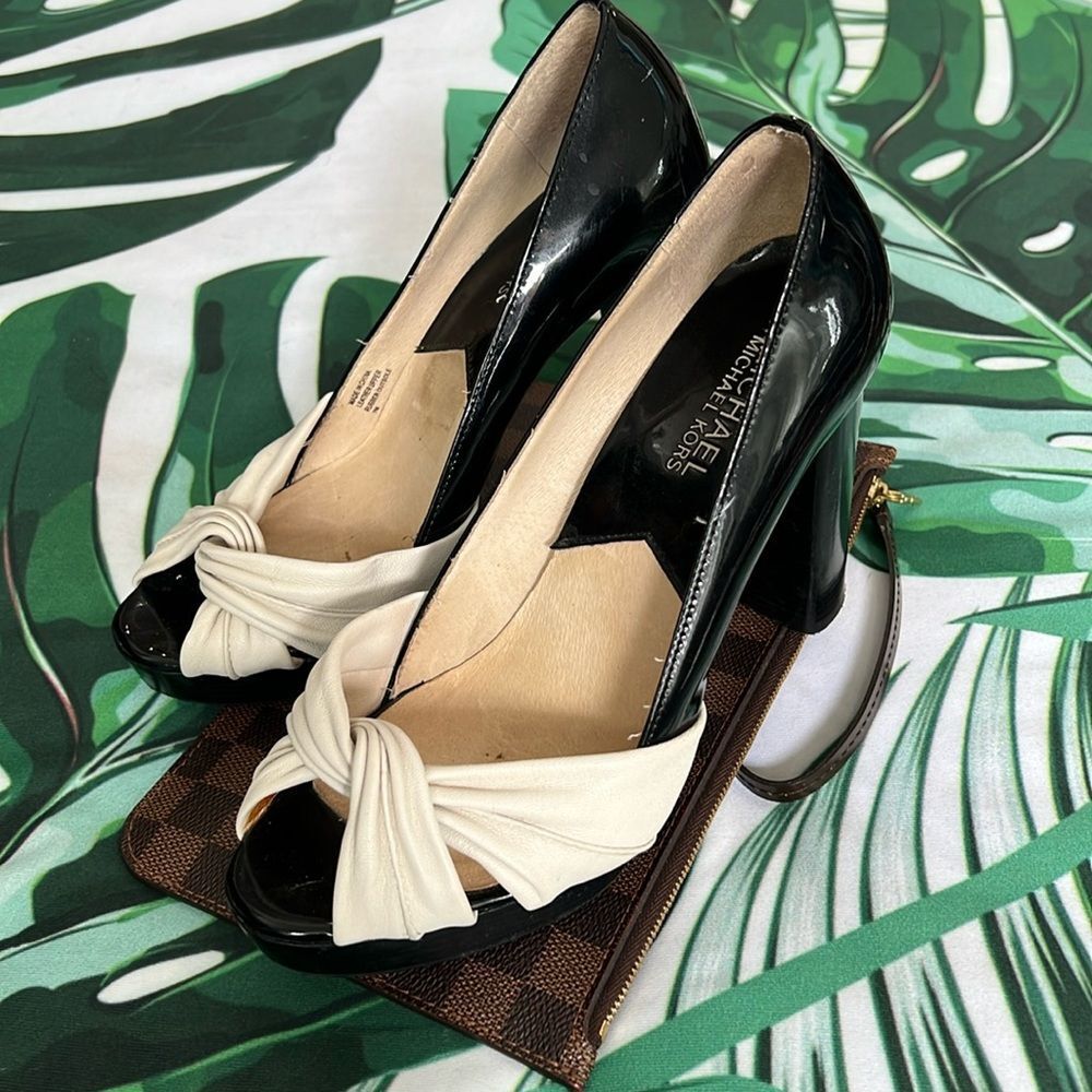 * Michael Kors, black and white pumps